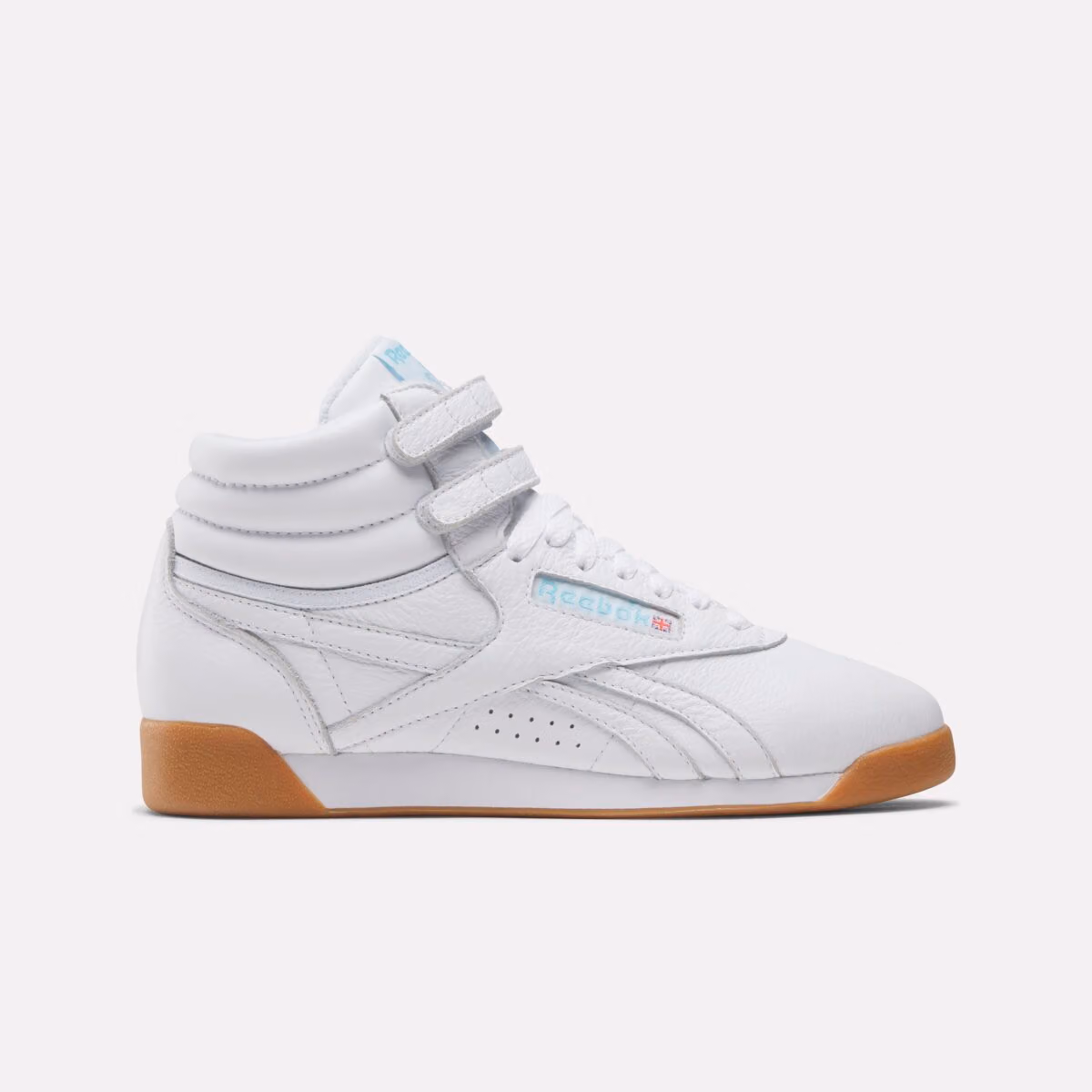 Karol G Teams Up with Reebok, Bringing the Freestyle Hi Back to Its White-and-Blue Roots