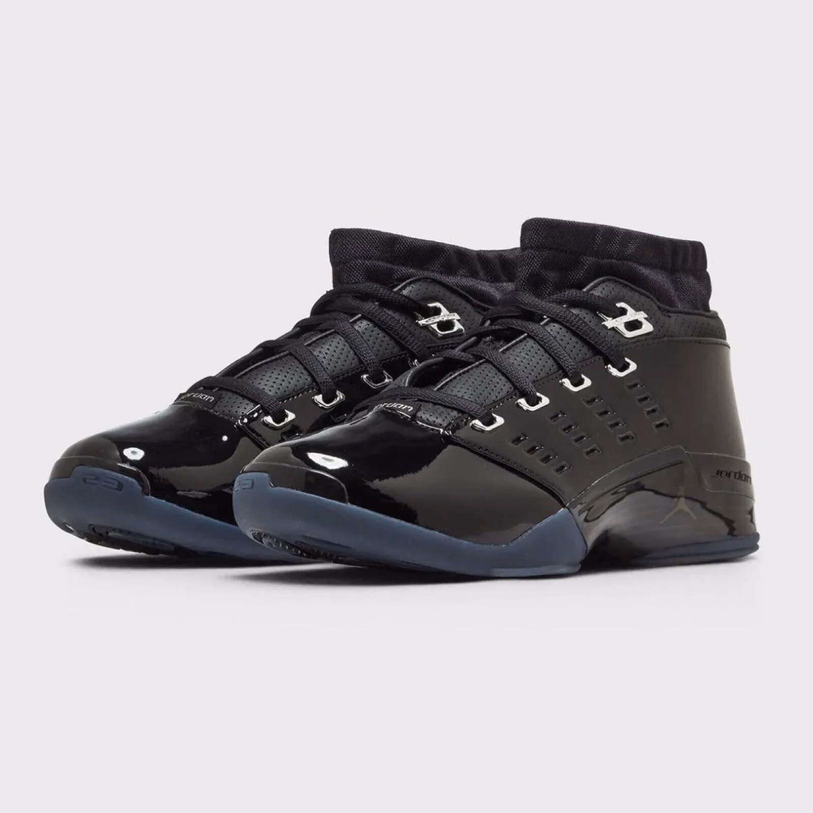 Air Jordan 17 Low retros in black patent leather, croc tongue replaced with perforated leather