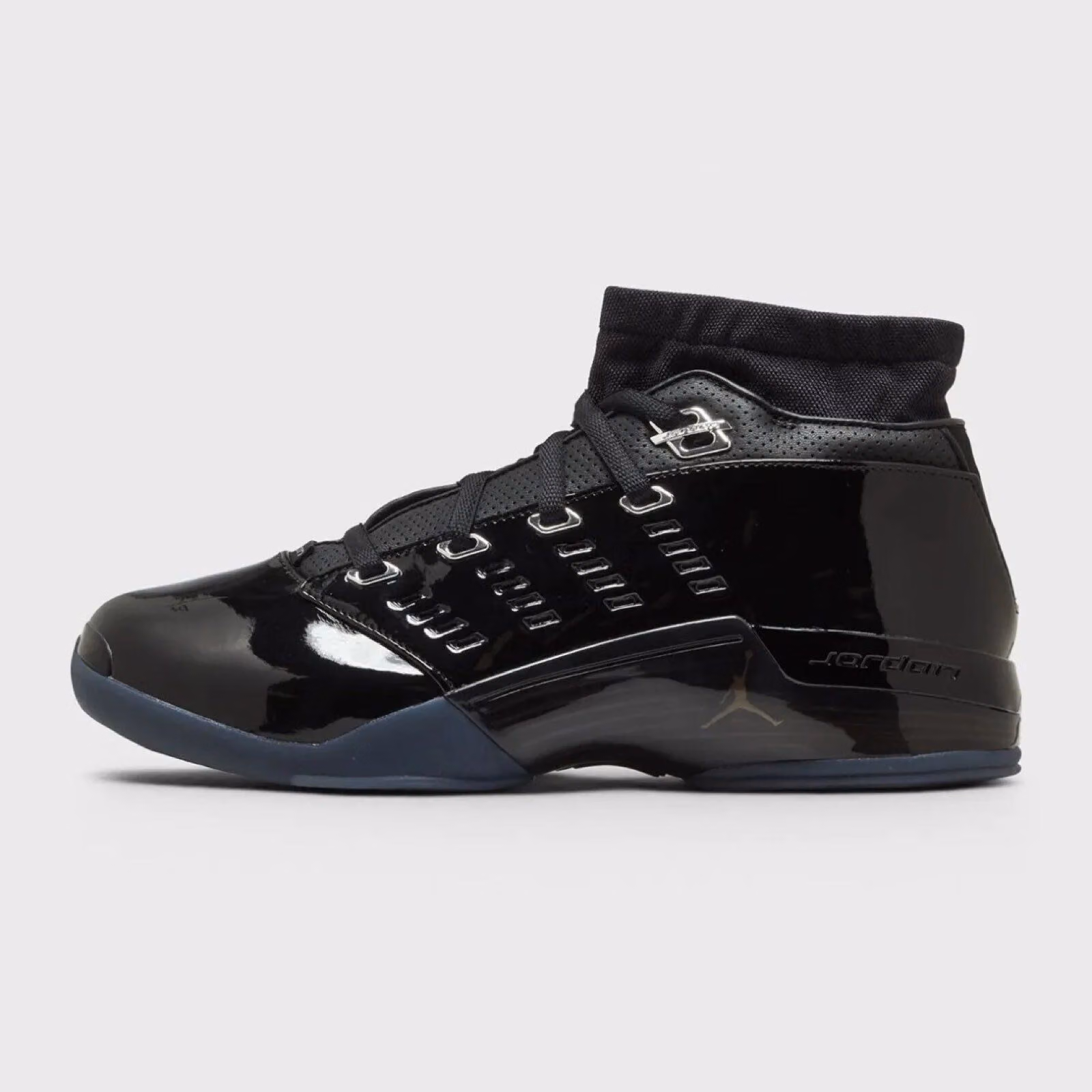 Air Jordan 17 Low retros in black patent leather, croc tongue replaced with perforated leather