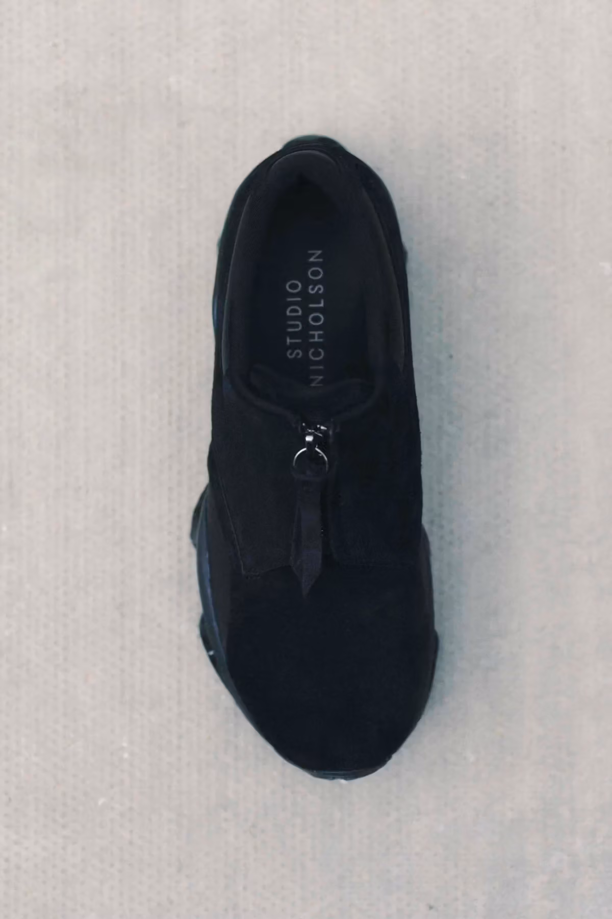 Logos Tucked Inside: STUDIO NICHOLSON x asics Turn a Sneaker into a Dress Code Accessory