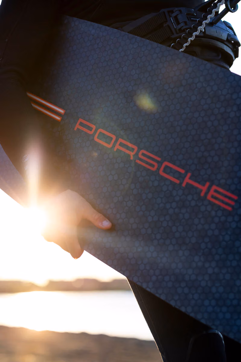 Porsche Turns Cayenne Turbo Electric's Horsepower Into a Kitesurfing Collection's Limited Run Number