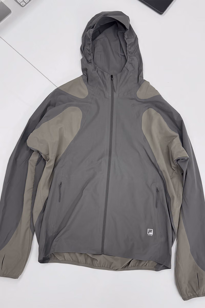 FILA Athletics FW26 "ORACLE": A Technical Jacket That Wears Aerial Terrain