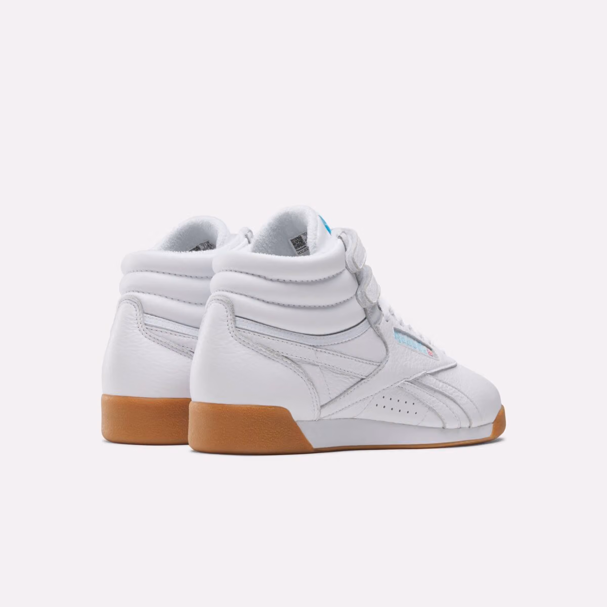Karol G Teams Up with Reebok, Bringing the Freestyle Hi Back to Its White-and-Blue Roots