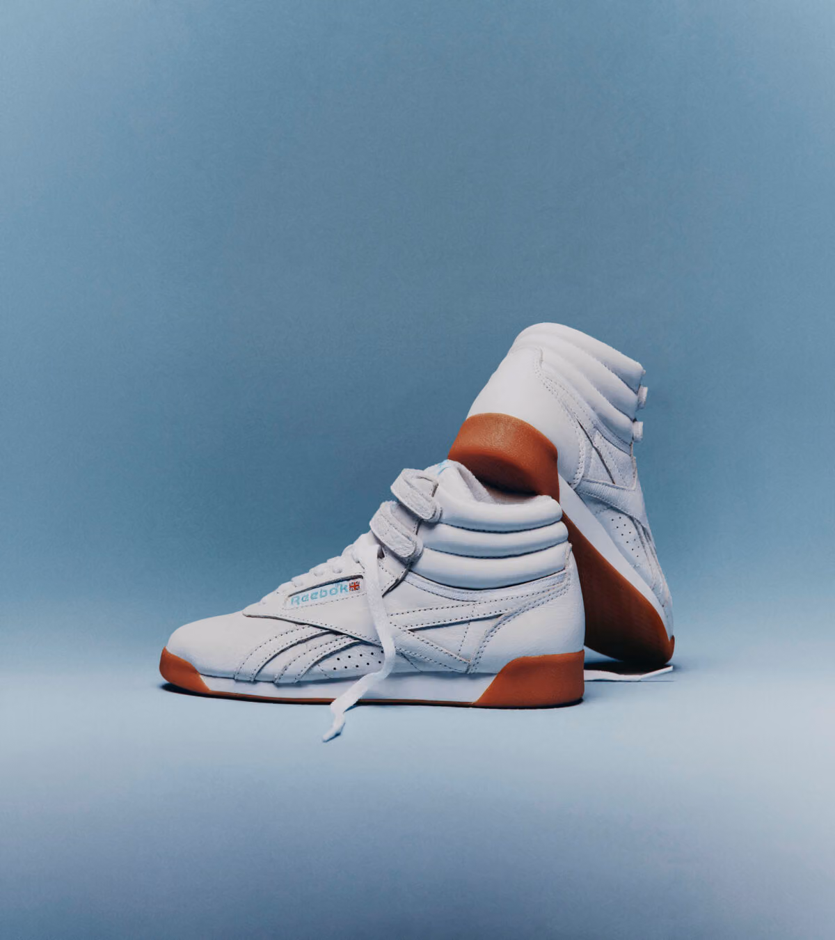 Karol G Teams Up with Reebok, Bringing the Freestyle Hi Back to Its White-and-Blue Roots