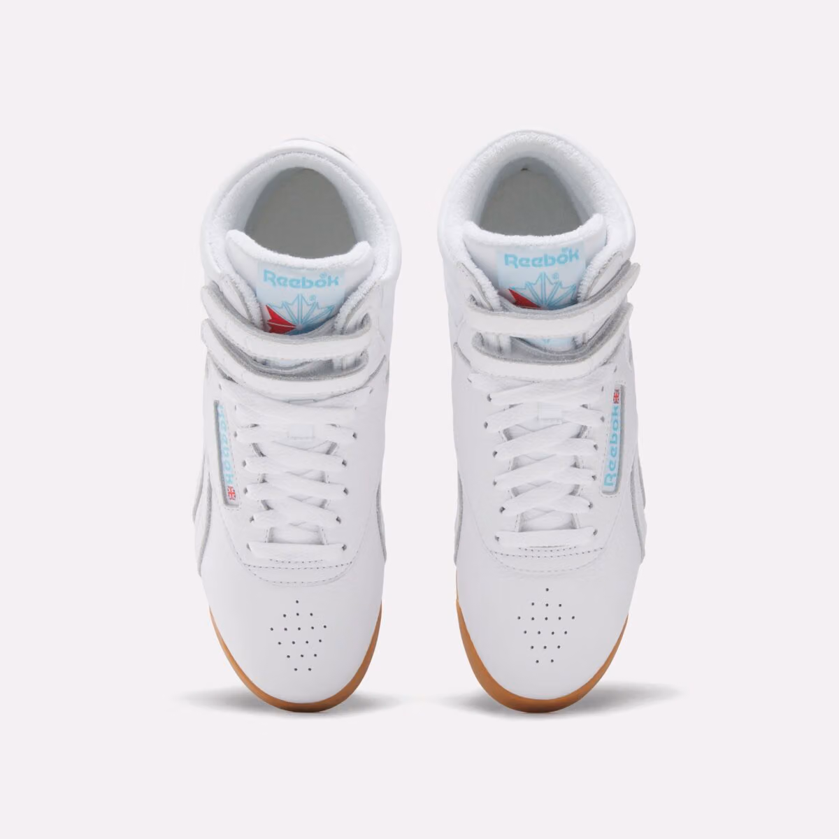 Karol G Teams Up with Reebok, Bringing the Freestyle Hi Back to Its White-and-Blue Roots