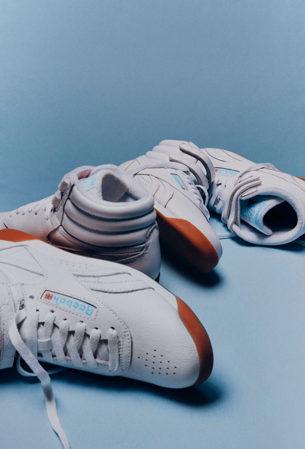 Karol G Teams Up with Reebok, Bringing the Freestyle Hi Back to Its White-and-Blue Roots