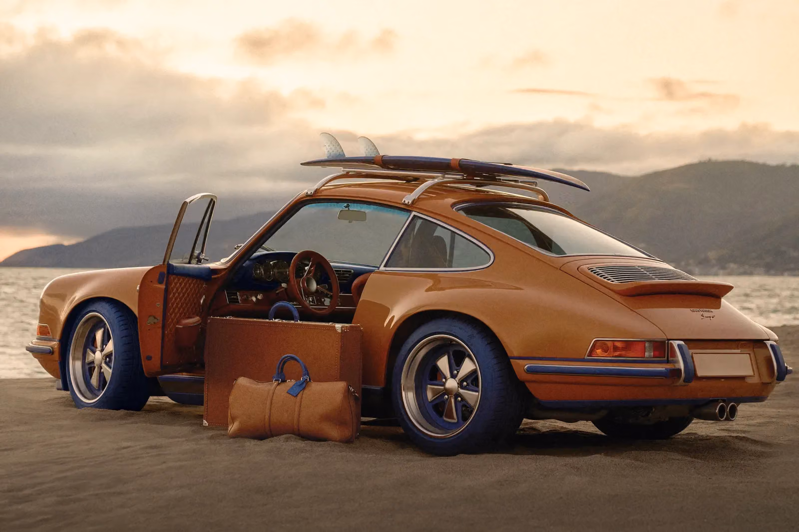 An unexpected dashboard clock request: LV and Singer turn two 911s into haute couture