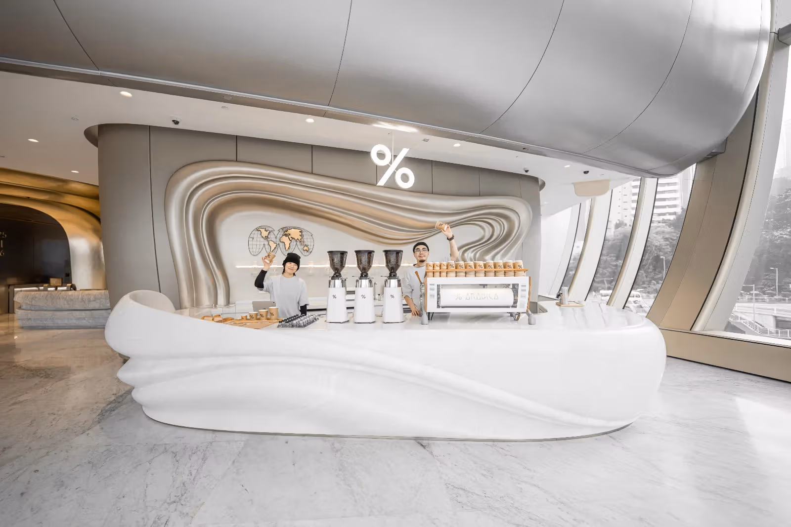 Storefront of the % Arabica café inside The Henderson building