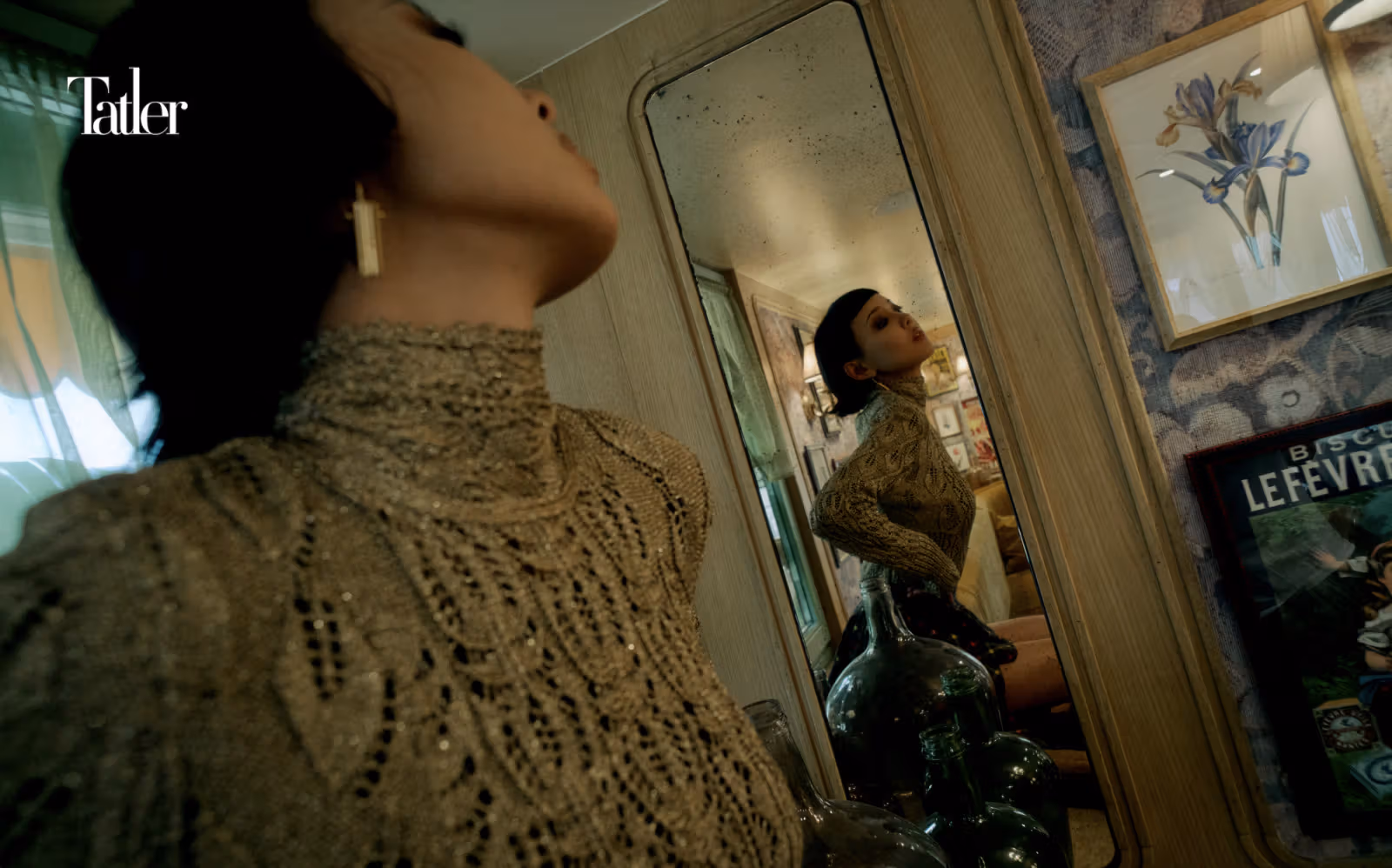 Gold knit top, draped plaid skirt, all by Louis Vuitton