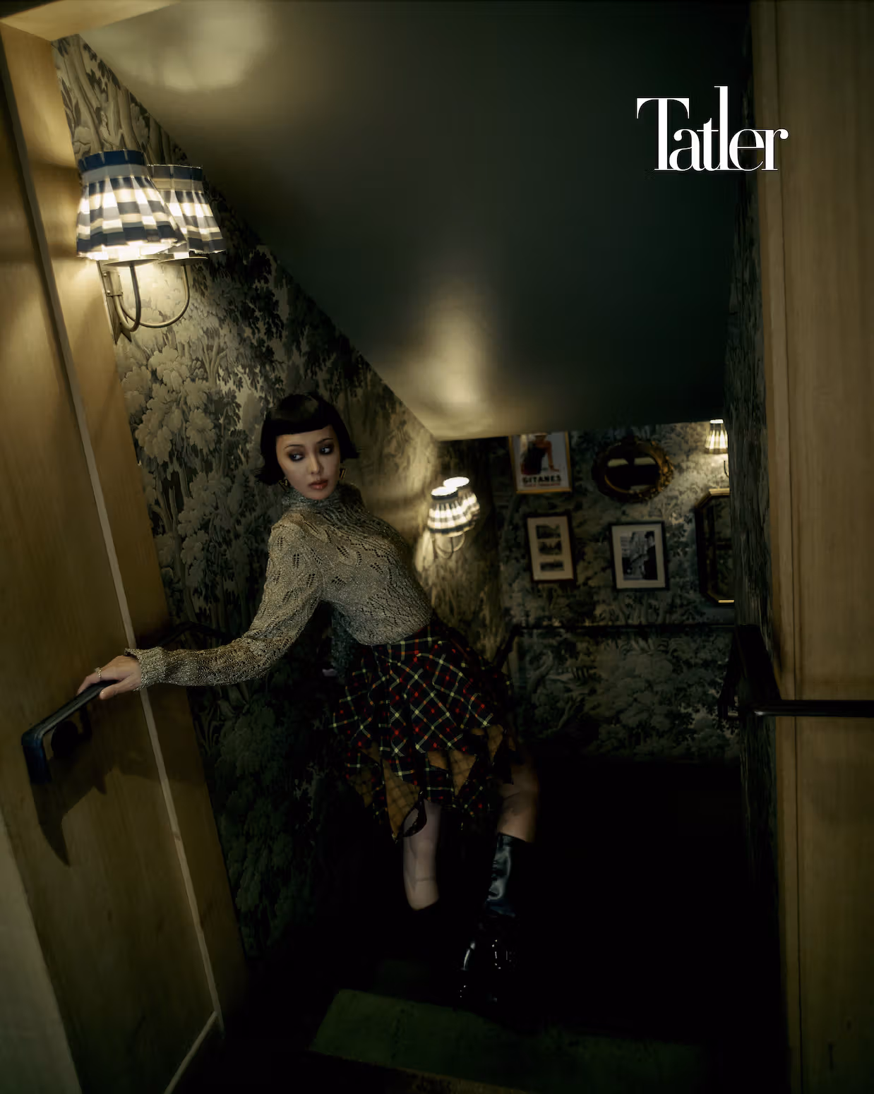 Gold knit top, draped plaid skirt, all by Louis Vuitton