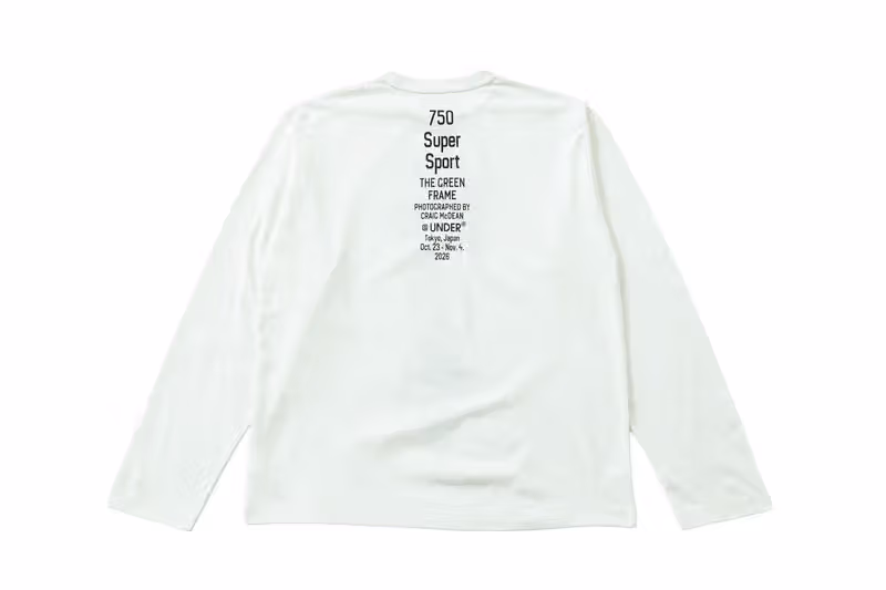 Back lettering on the white long-sleeve top