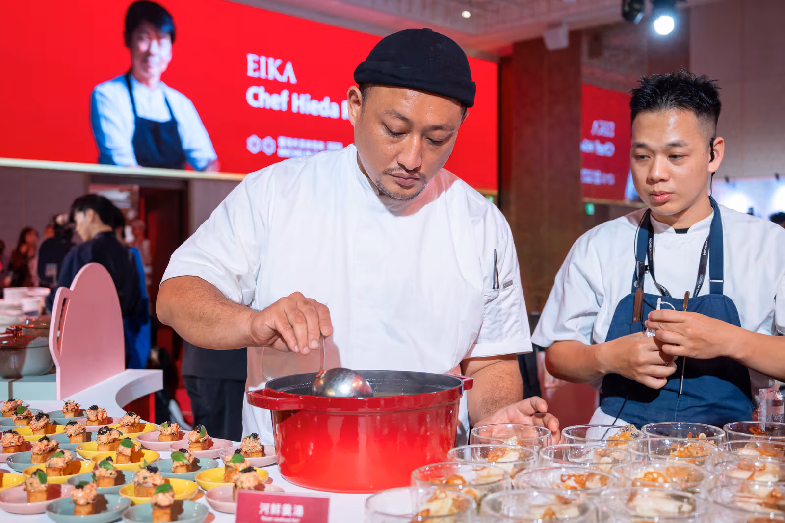 Chef Ian Li cooks seafood soup in a STAUB cast iron pot