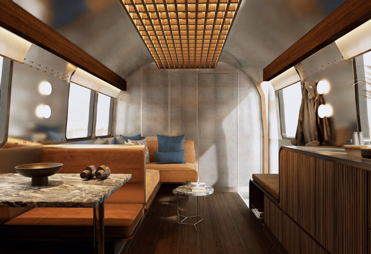 Rendering of seating and dining inside an Airstream