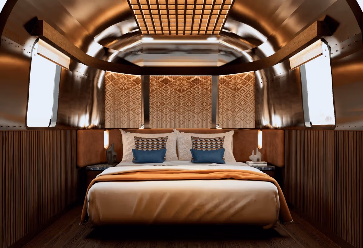 Rendering of a suite’s bed and curved Airstream interior