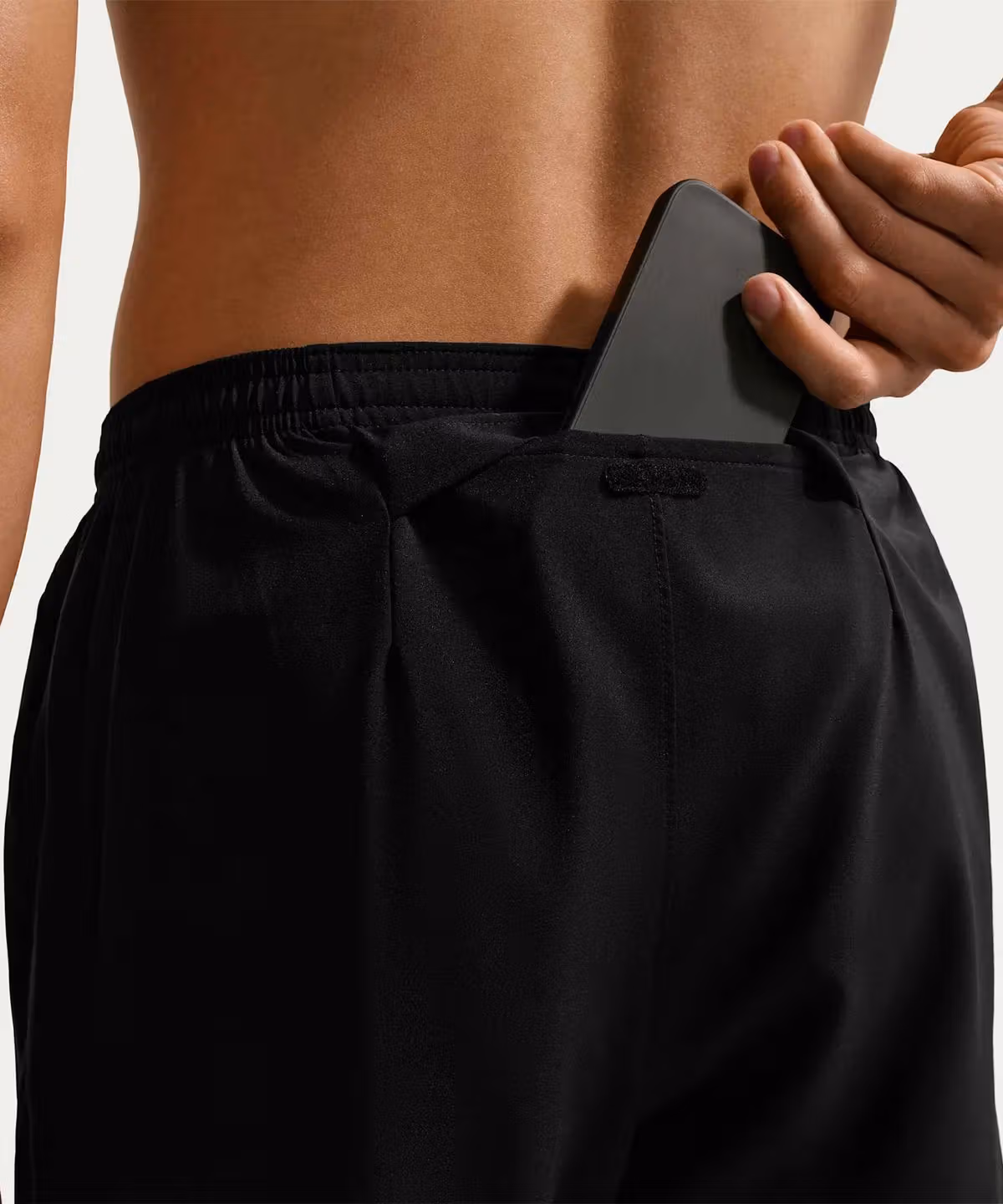 Nike Miler’s rear pocket demonstrates phone storage