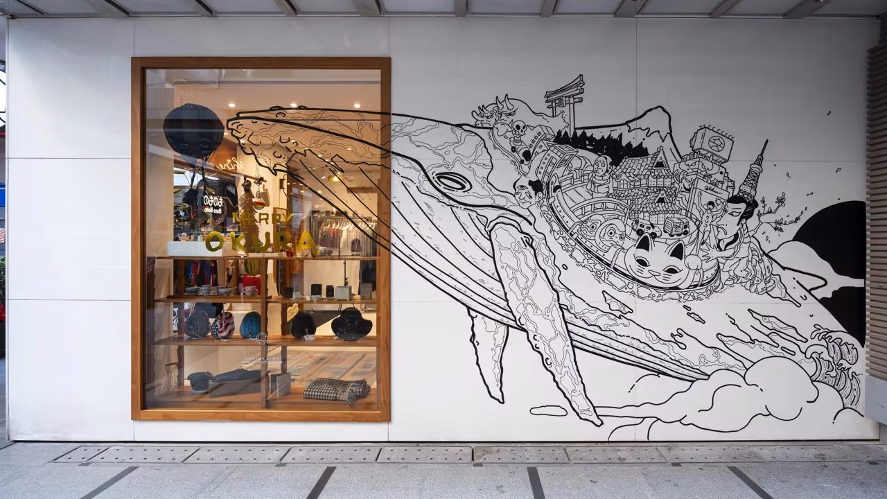 Large black-and-white illustration beside an OKURA window