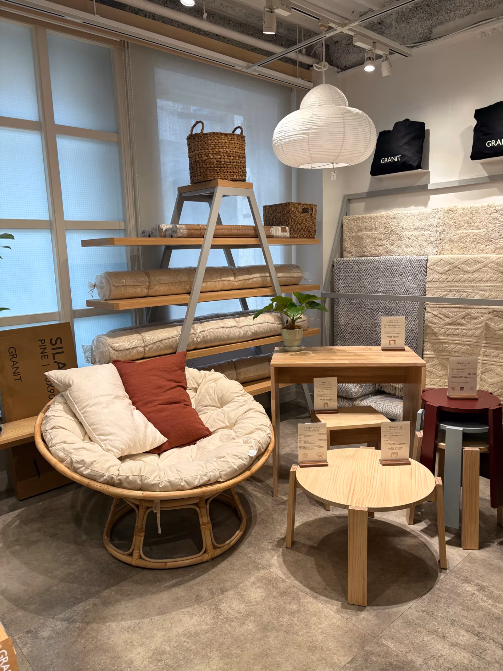 Lamps, chair cushions and wooden furniture at GRANIT