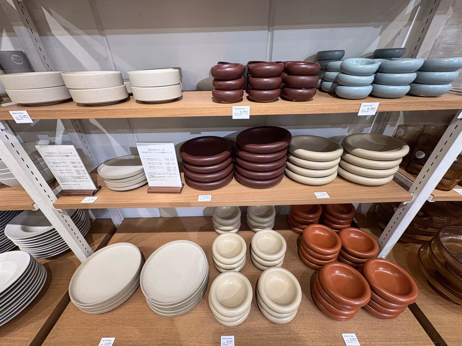 Cream, reddish-brown and pale blue tableware at GRANIT