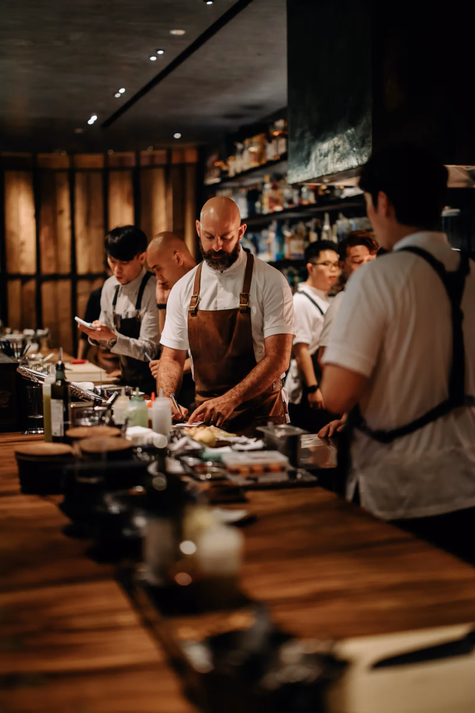 Dave Pynt and colleagues behind a worktop in the Singapore restaurant