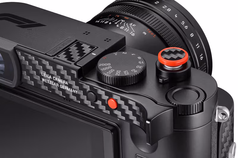 Close-up of the Leica Q3 43 F1 top plate, carbon fibre and shutter