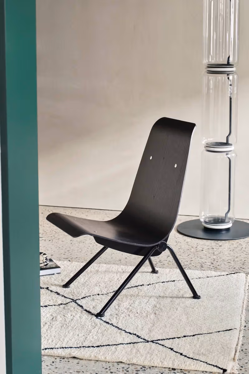 Jean Prouvé Antony 2026 black chair viewed diagonally indoors
