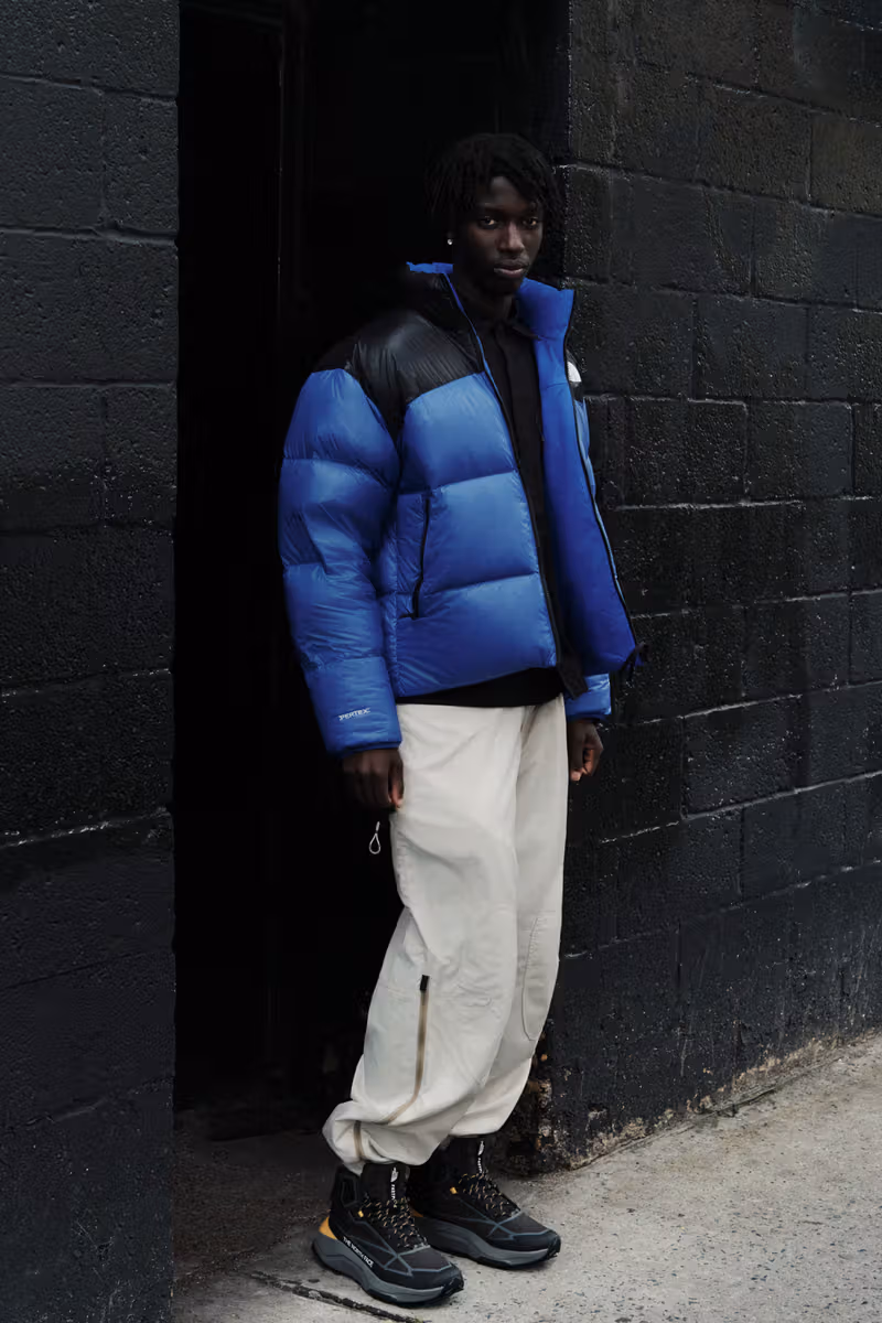 The North Face reversible Pertex Nuptse: glossy baffles and smooth blue, at USD430