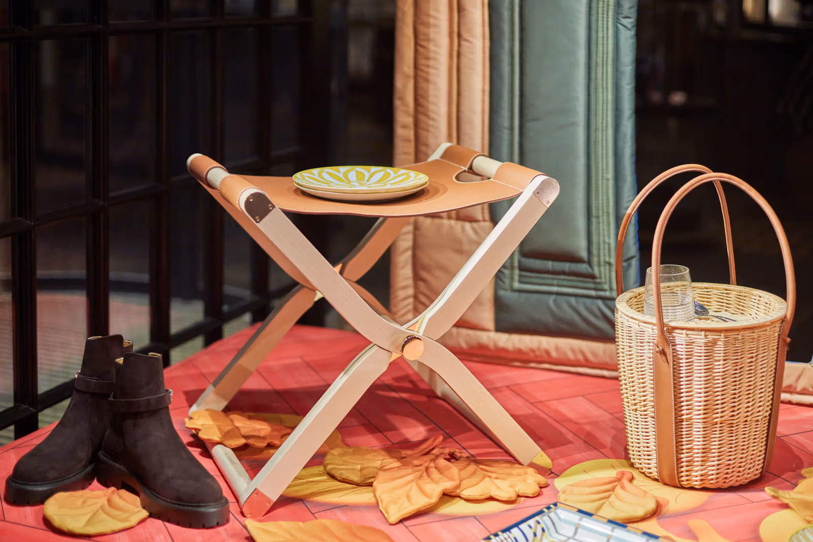 Wooden folding stool and quilted floor inside Ciel de Lit