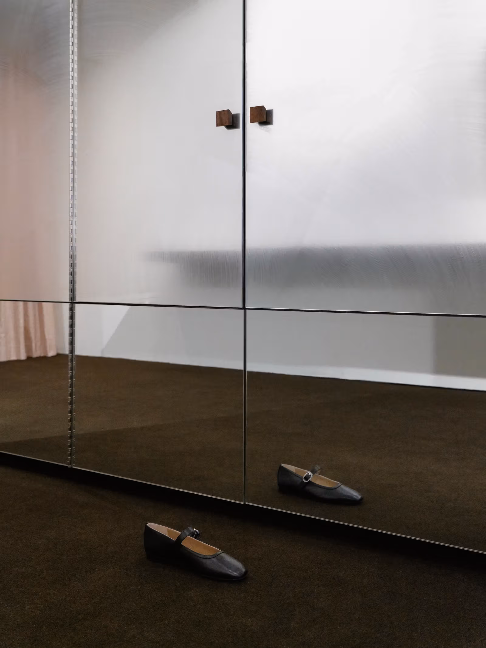 Low mirrors and shoes at Le Monde Béryl New York