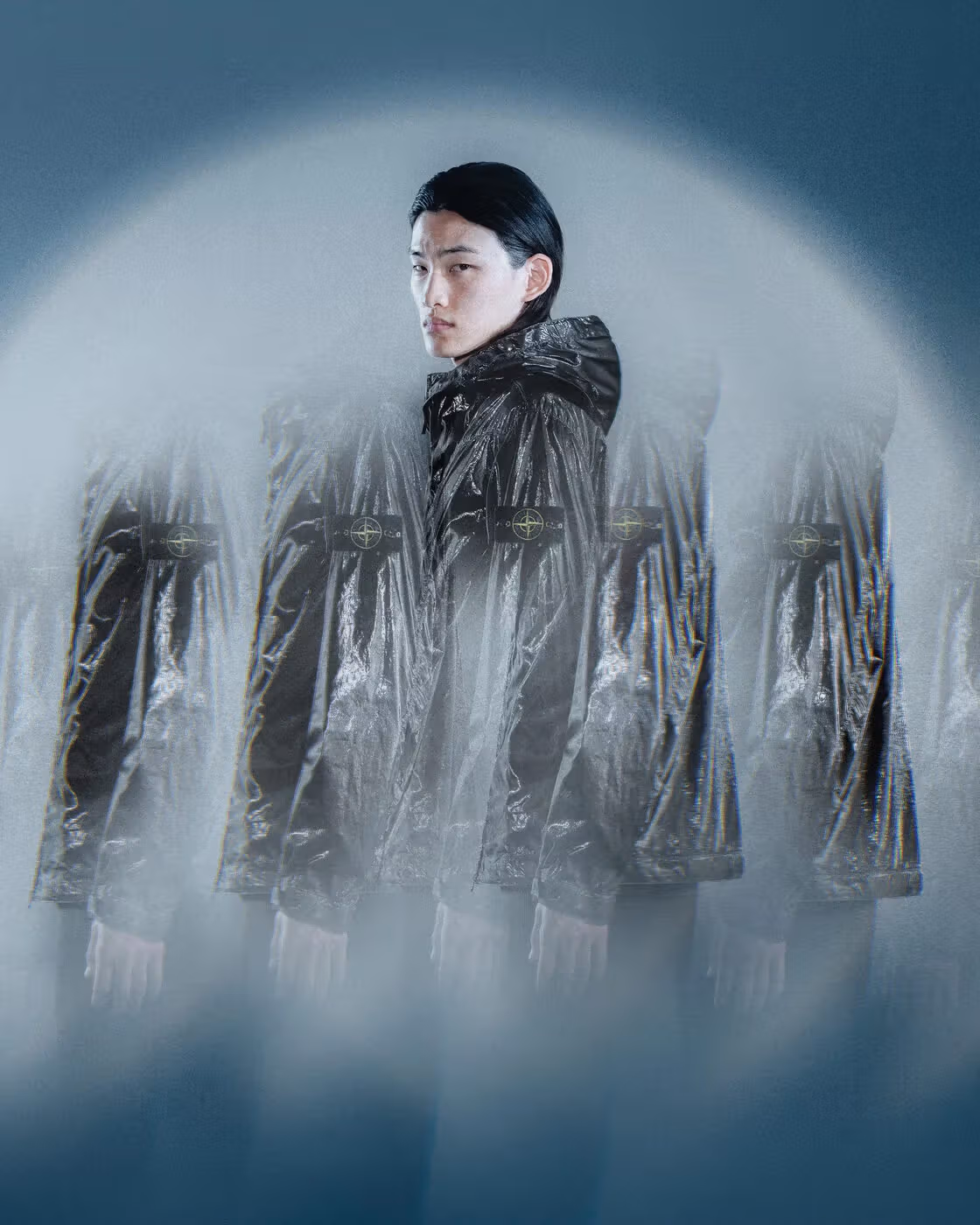 A reflective-textured jacket presented with layered portraits.