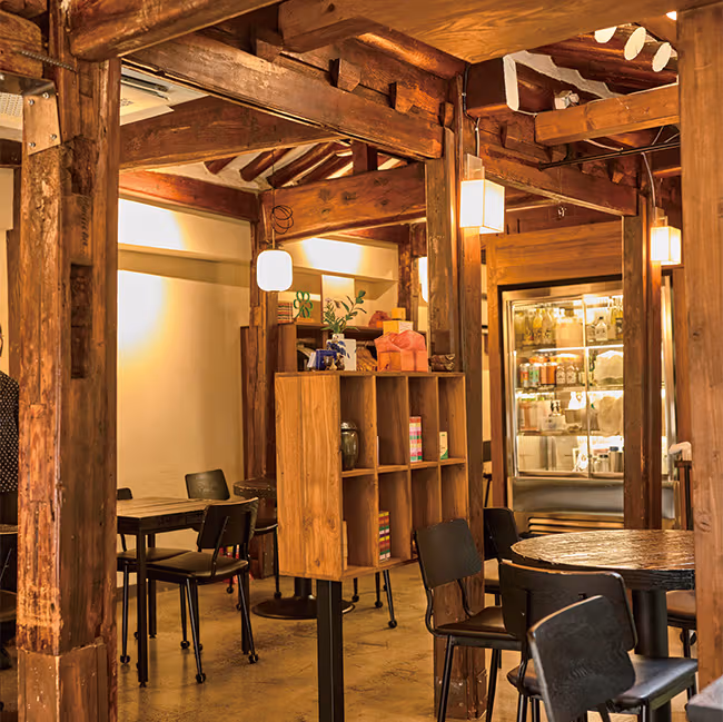 The timber interior of A Flower Blossom on the Rice, a venue in the 2026 selection.