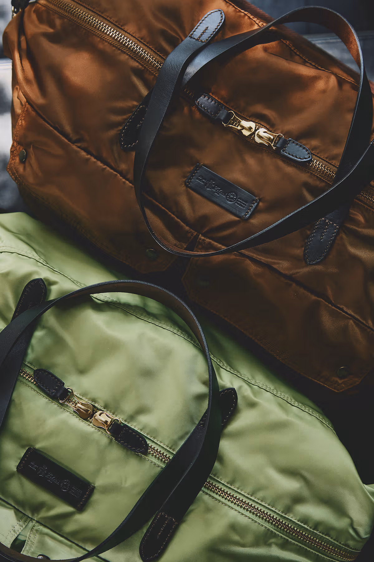 Brown and light-green Frontiera bag details
