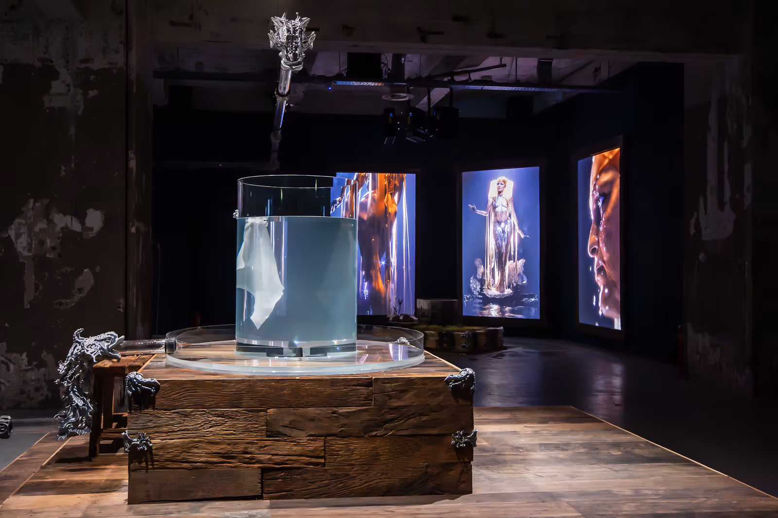 Everything Moist Seems Alive water container and screen installation