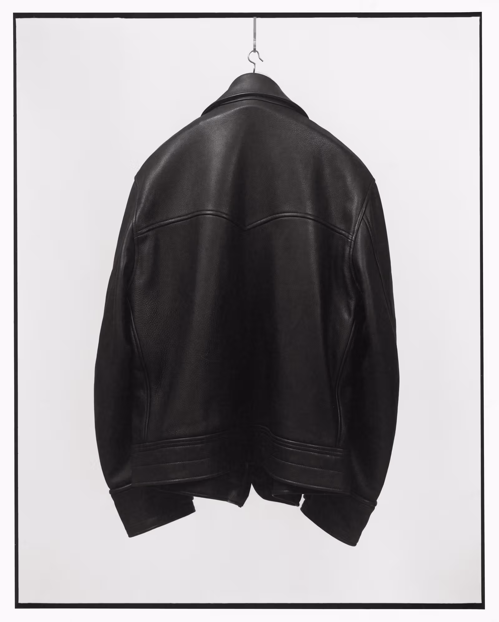 Black leather jacket back and waist panels