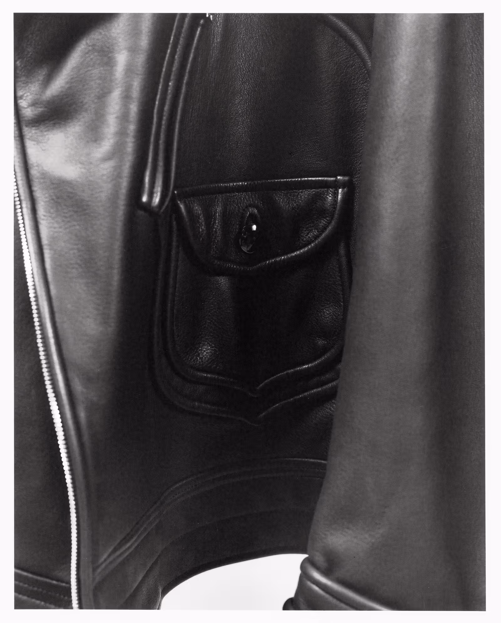 Motorcycle jacket D-pocket and flap pocket