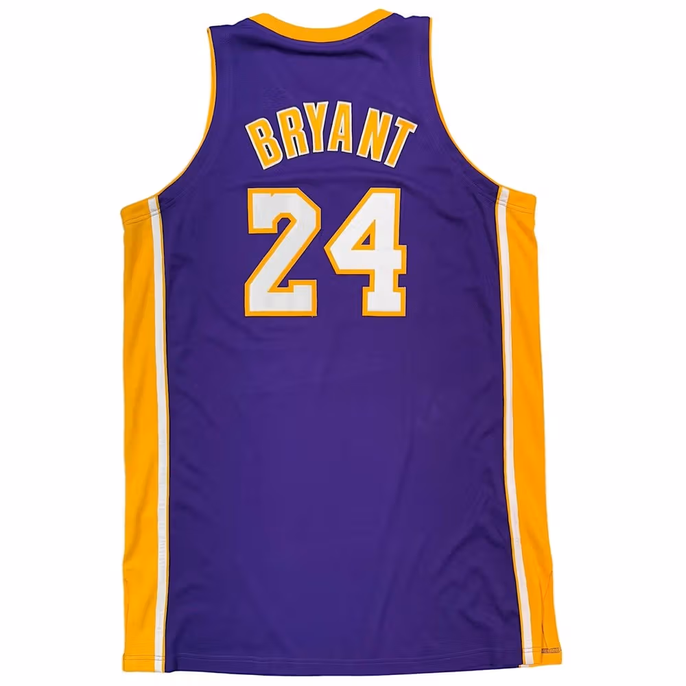 Purple-and-yellow jersey back with BRYANT and number 24