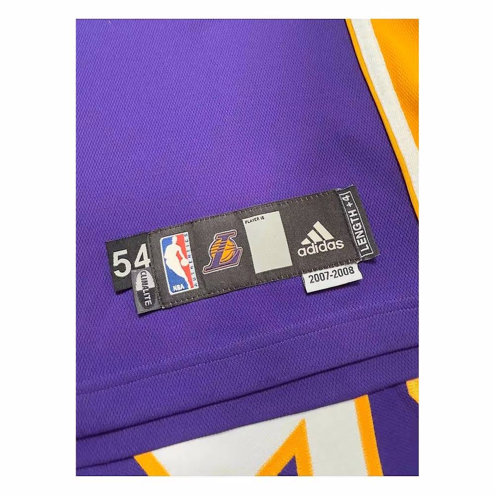 Purple jersey label showing 54, adidas and 2007–2008