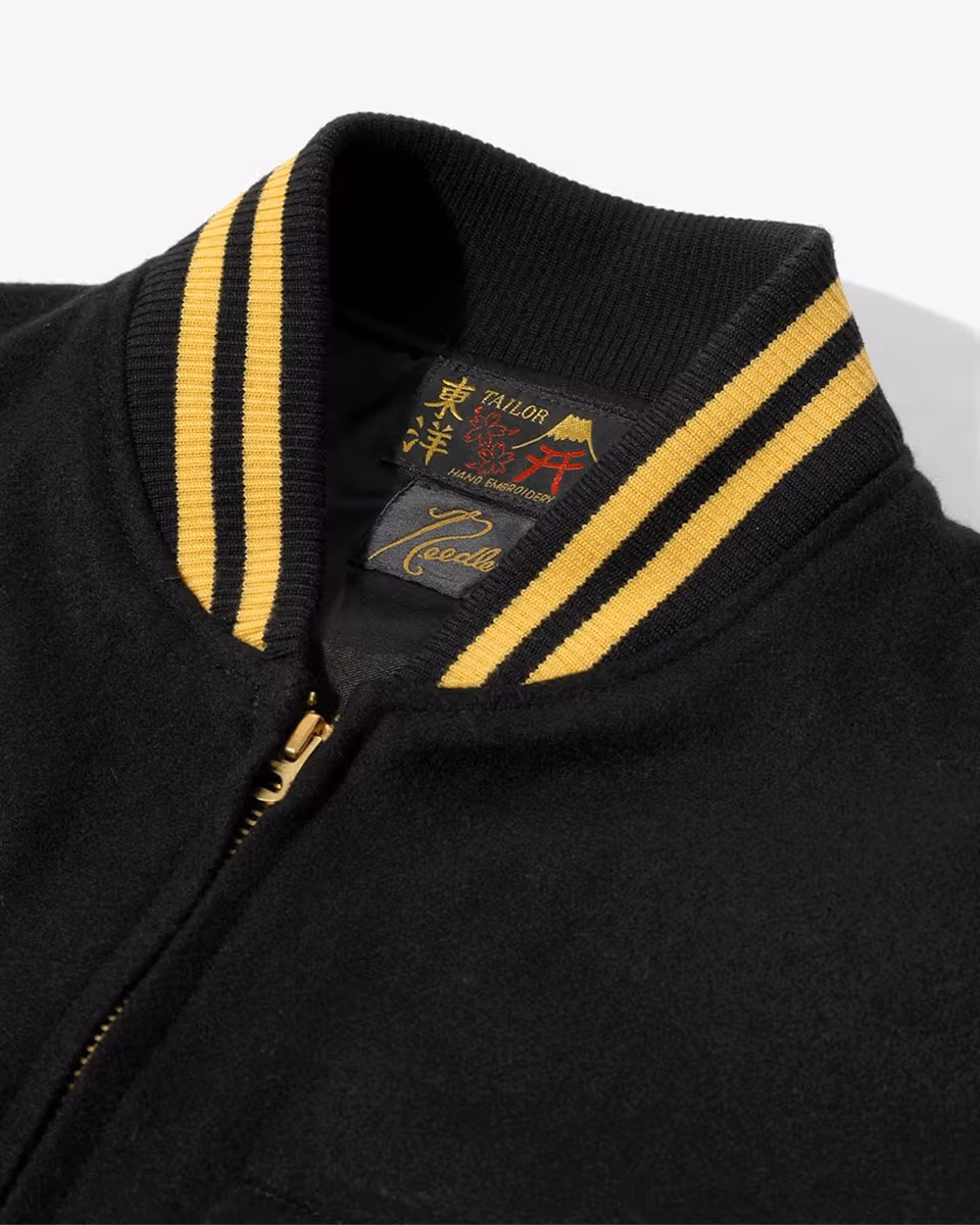 Black wool jacket collar and brand labels