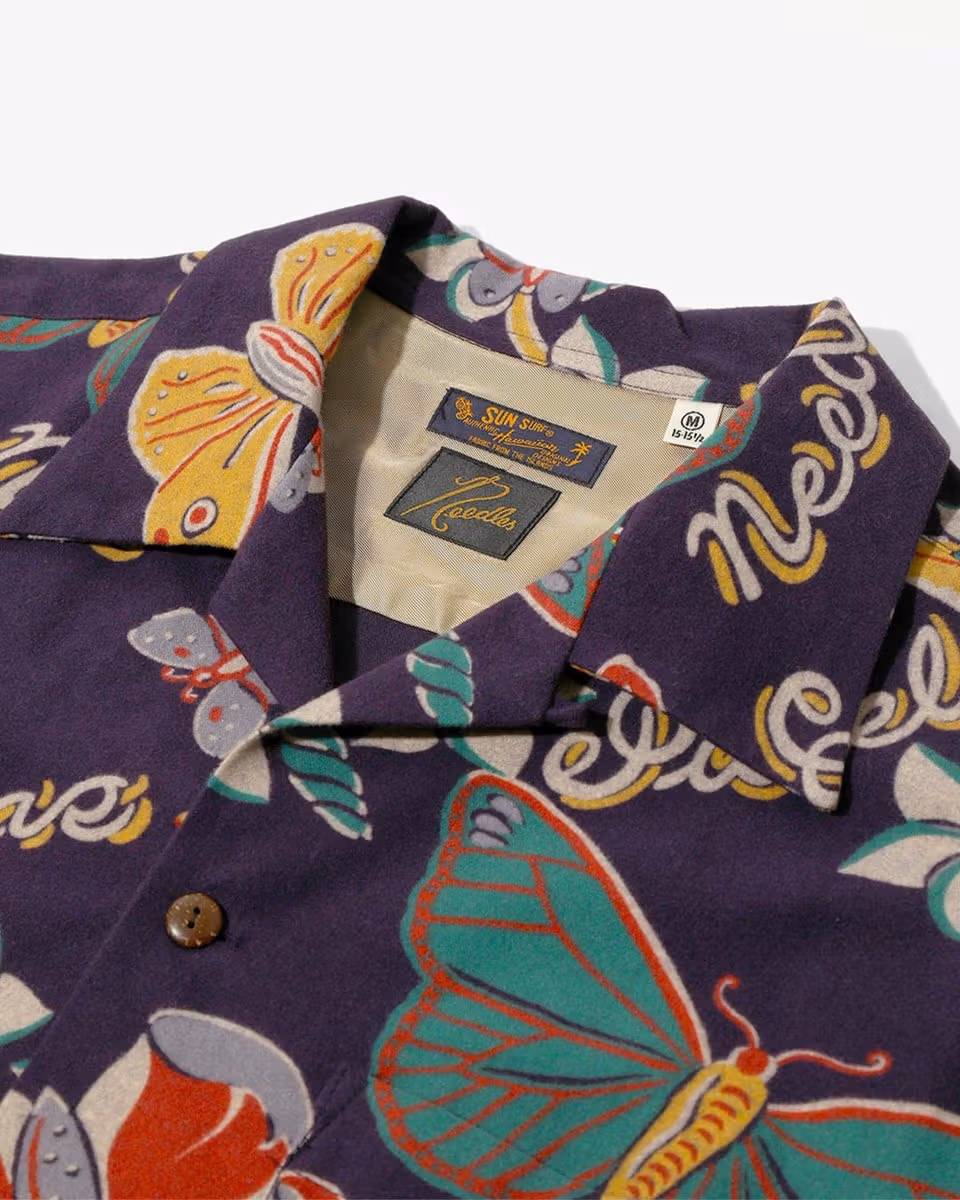 Close-up of SUN SURF collaboration dark butterfly shirt