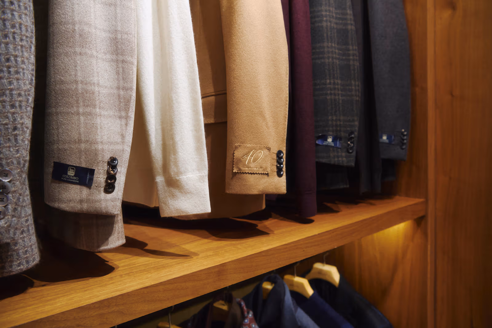 Close view of jacket cuffs, buttons and a 40th-anniversary cloth label