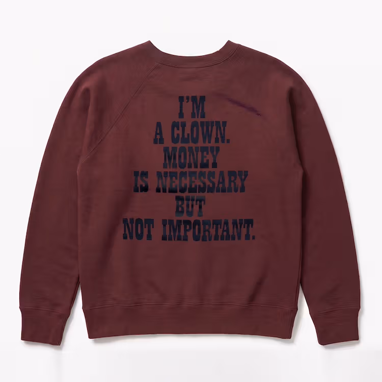 Lettering on the back of the burgundy sweatshirt