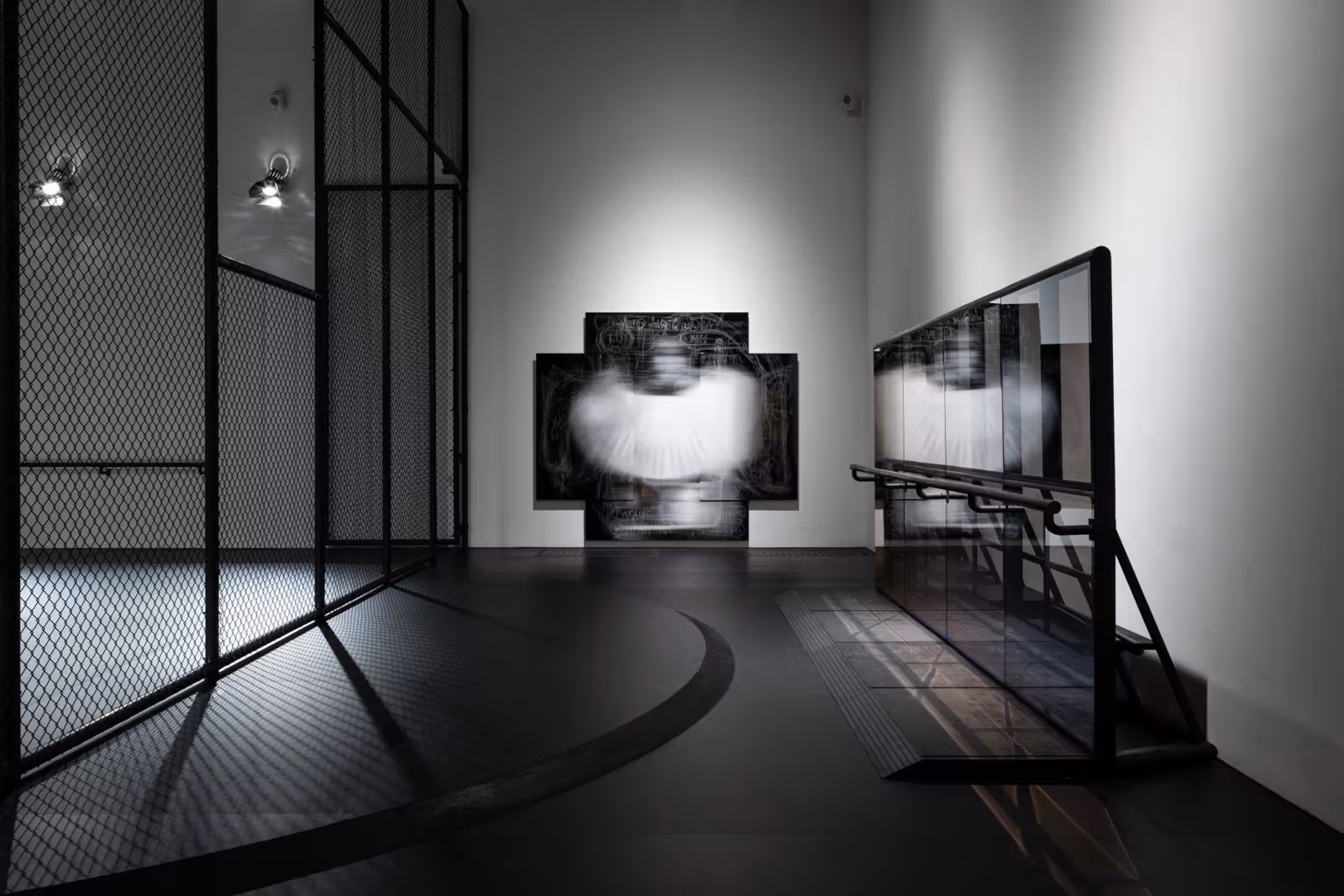 House of Swans, third-floor main gallery: black mesh and a transparent partition shape the viewing boundaries.
