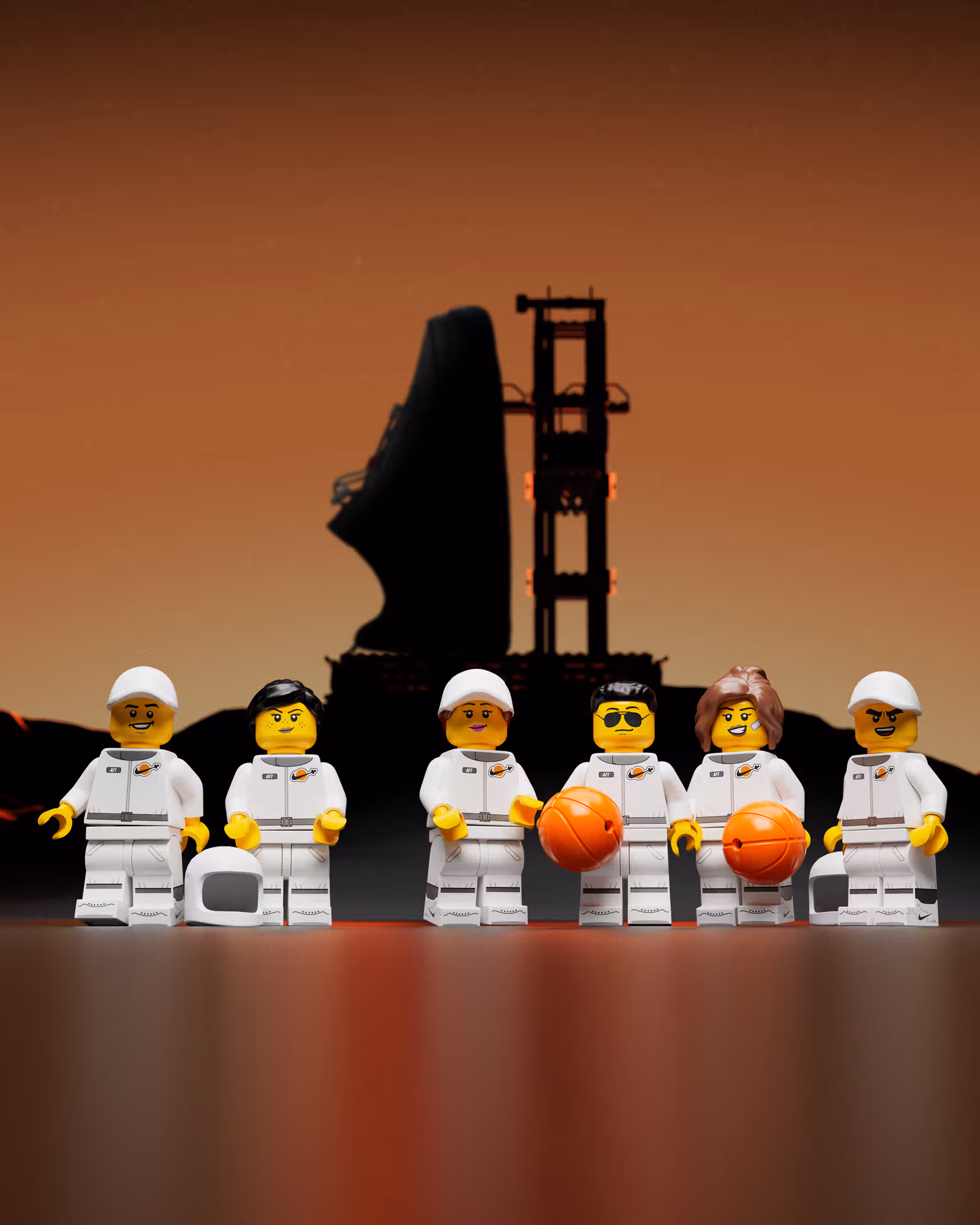 公式イメージに登場する宇宙飛行士風のLEGOミニフィギュアとバスケットボール小物。同梱品を示す画像ではない。